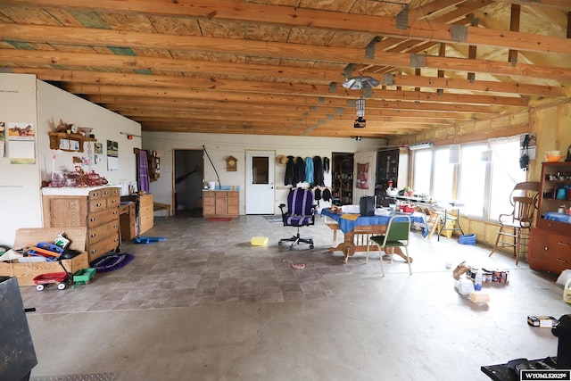 misc room featuring lofted ceiling