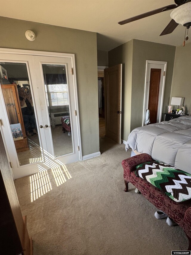 716 B St, Rock Springs, WY 82901 - bedroom with baseboards, ceiling fan, french doors, and carpet flooring