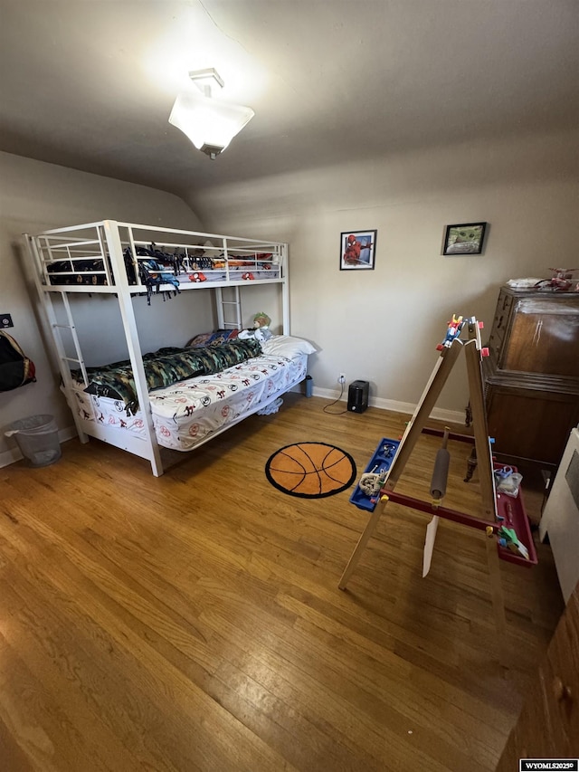 716 B St, Rock Springs, WY 82901 - bedroom with baseboards and wood finished floors