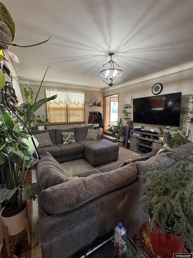 716 B St, Rock Springs, WY 82901 - living area with crown molding and a chandelier