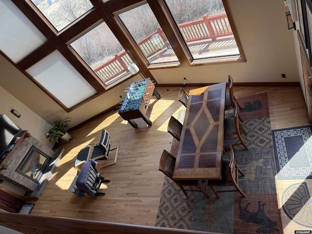 living room featuring wood finished floors and baseboards