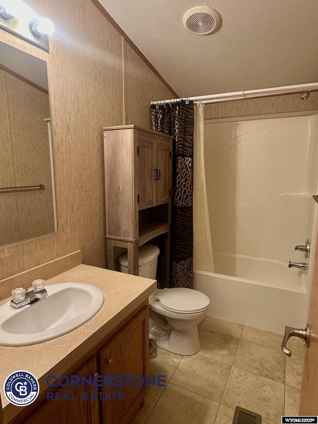 full bath with lofted ceiling, visible vents, shower / bath combo with shower curtain, toilet, and vanity