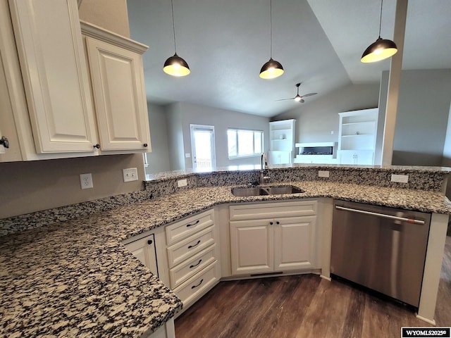 kitchen featuring a sink, ceiling fan, vaulted ceiling, dishwasher, and dark wood finished floors