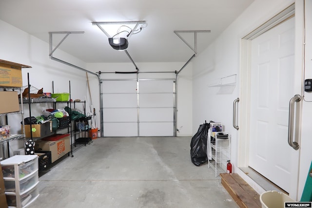 garage featuring a garage door opener