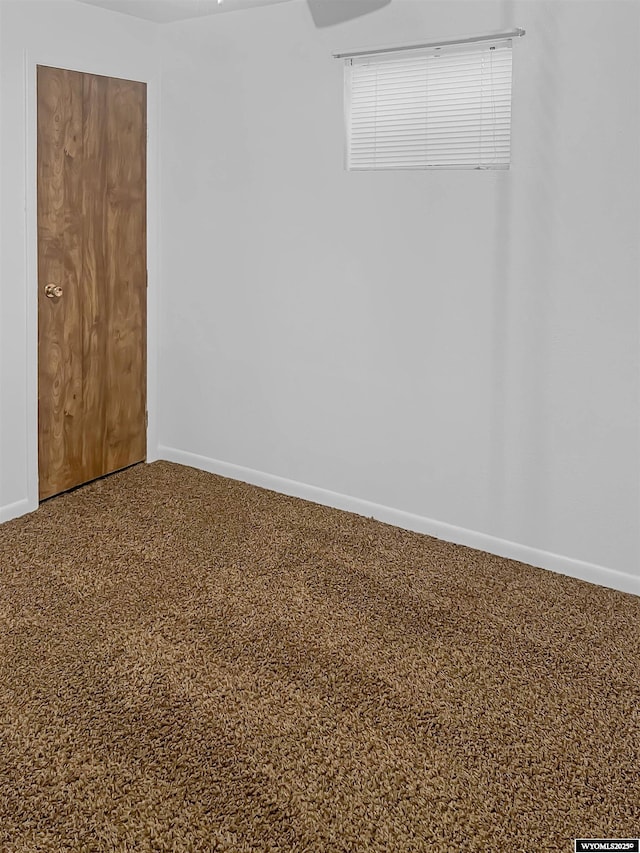 336 Emerson Ave, Evanston, WY 82930 - empty room featuring baseboards and carpet flooring