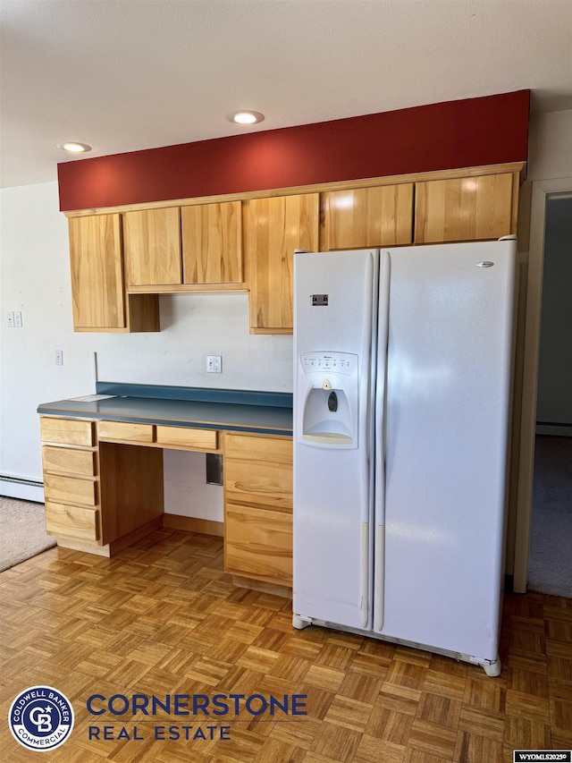 kitchen featuring baseboard heating, white refrigerator with ice dispenser, built in study area, recessed lighting, and a baseboard heating unit