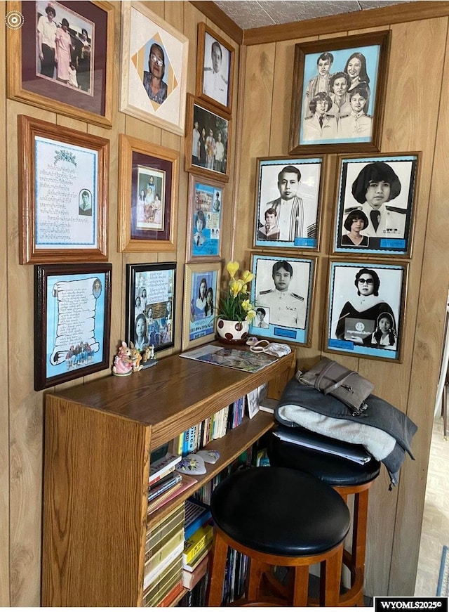 home office with wood walls