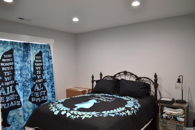 bedroom with recessed lighting and visible vents