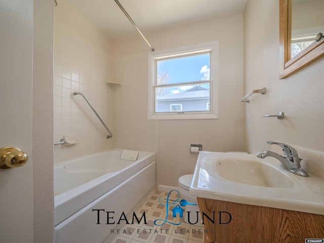 full bath featuring vanity, baseboards, shower / bathtub combination, and toilet