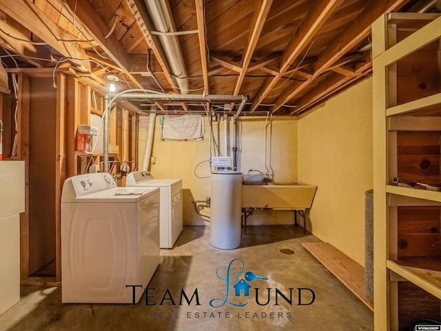 unfinished below grade area with washer and clothes dryer