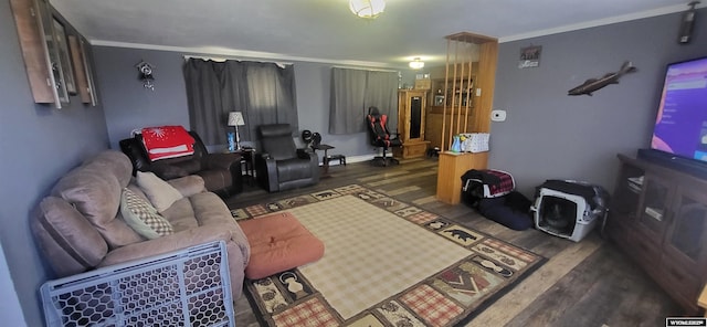 living room with crown molding and wood finished floors