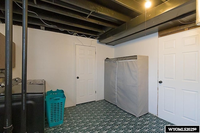 finished basement featuring dark floors