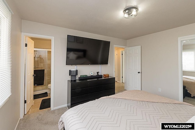 bedroom with light colored carpet