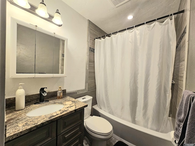 full bath with toilet, visible vents, shower / bath combo, and vanity