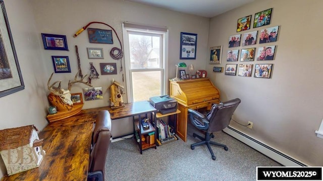 carpeted home office featuring a baseboard radiator