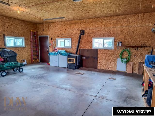 garage featuring a wood stove