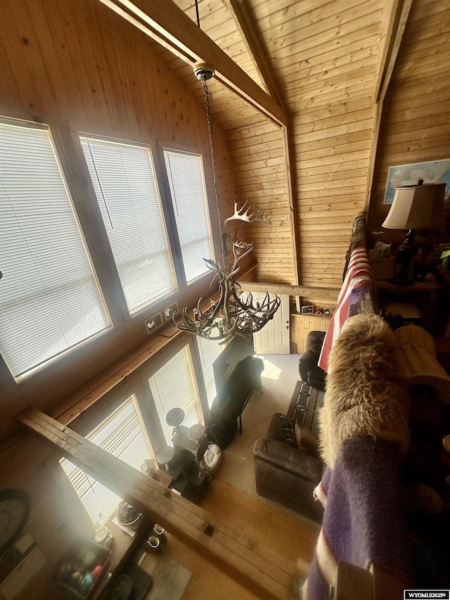 2025 Rolling Hls, Kemmerer, WY 83101 - interior space featuring beamed ceiling, wood walls, and wood ceiling
