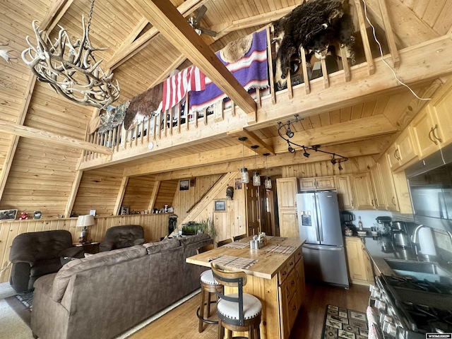 2025 Rolling Hls, Kemmerer, WY 83101 - kitchen with wood ceiling, appliances with stainless steel finishes, dark wood-style floors, and butcher block counters