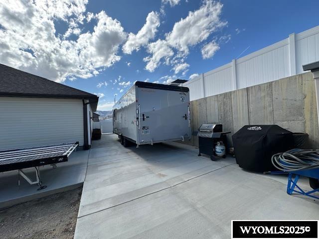 109 Chardonnay, Rock Springs, WY 82901 - view of vehicle parking featuring fence