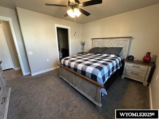 109 Chardonnay, Rock Springs, WY 82901 - bedroom with baseboards, a ceiling fan, and carpet