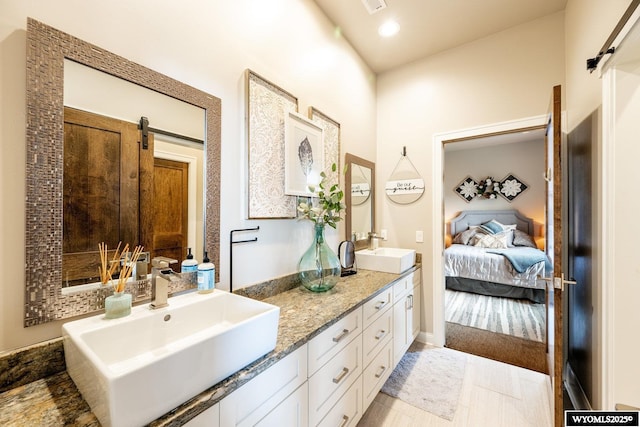 88 Turnberry Dr, Sheridan, WY 82801 - ensuite bathroom with double vanity, a sink, ensuite bath, and visible vents