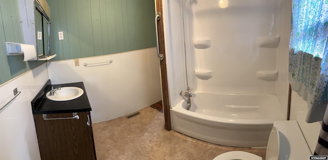 124 Railroad St, Lingle, WY 82223 - bathroom with visible vents, bathing tub / shower combination, and vanity