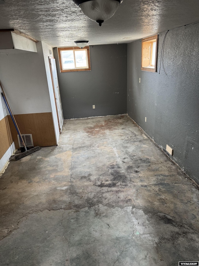 124 Railroad St, Lingle, WY 82223 - below grade area featuring a textured wall
