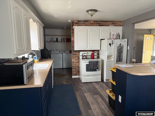 kitchen featuring blue cabinets, light countertops, white cabinets, white appliances, and washer and clothes dryer