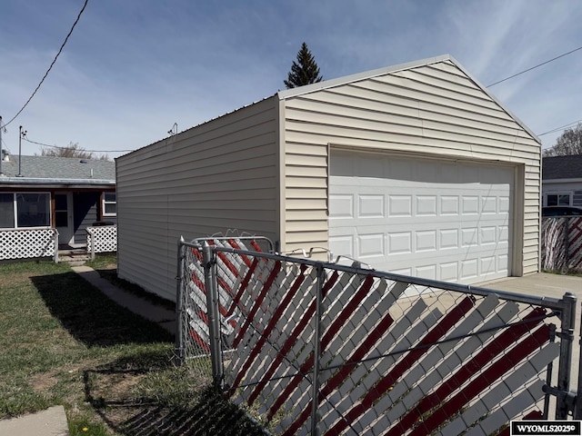 detached garage with fence
