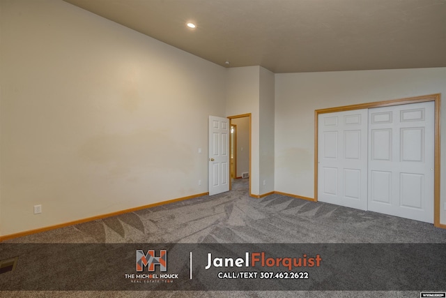 unfurnished bedroom featuring baseboards, carpet, recessed lighting, and lofted ceiling