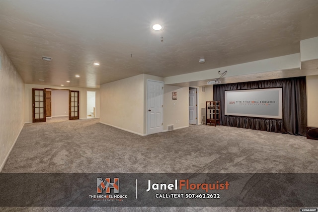 interior space with recessed lighting, carpet, baseboards, and visible vents