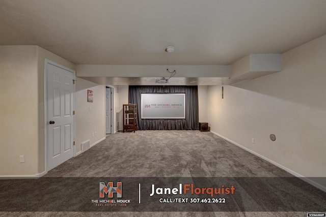 cinema with baseboards, visible vents, and carpet