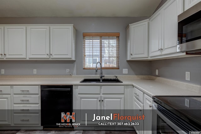 kitchen featuring black dishwasher, stainless steel microwave, a sink, and white cabinets