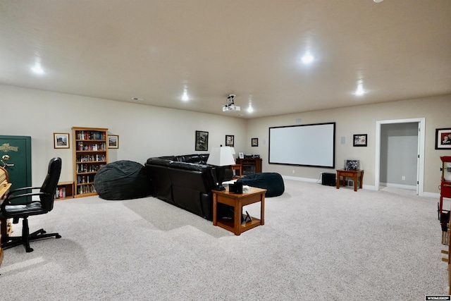 home theater with carpet flooring and baseboards