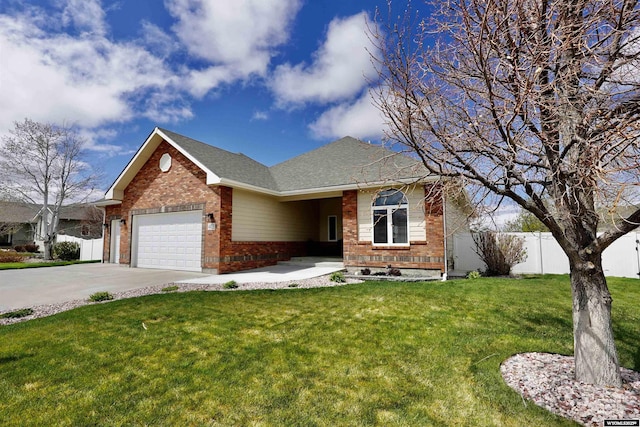 ranch-style house with brick siding, fence, a front lawn, concrete driveway, and an attached garage