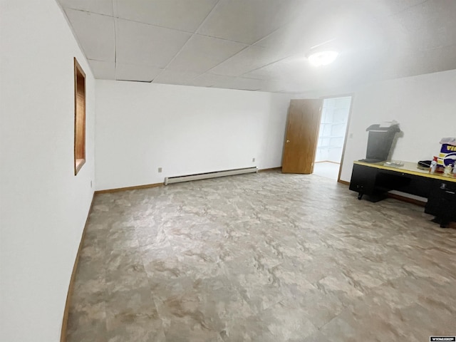 interior space with baseboards and a baseboard heating unit