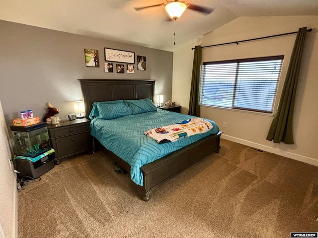 999 Eagle Dr, Douglas, WY 82633 - carpeted bedroom featuring vaulted ceiling, baseboards, and ceiling fan