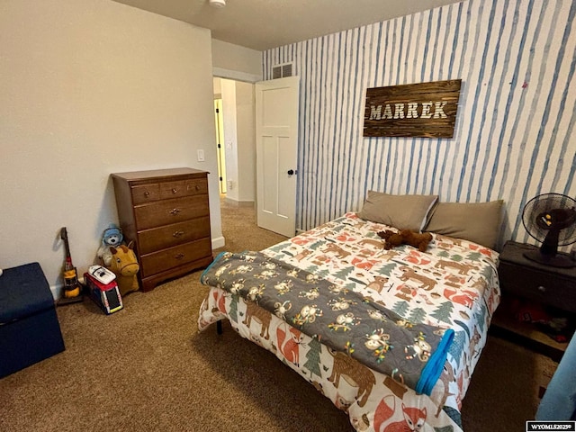 999 Eagle Dr, Douglas, WY 82633 - carpeted bedroom with wallpapered walls