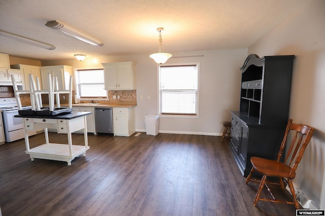 kitchen with backsplash, electric range, stainless steel dishwasher, dark wood-style floors, and white cabinetry