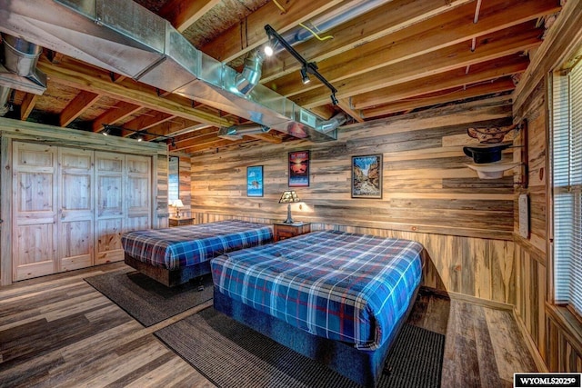 18 High Meadows Rd, Buffalo, WY 82834 - bedroom with wooden walls and wood finished floors