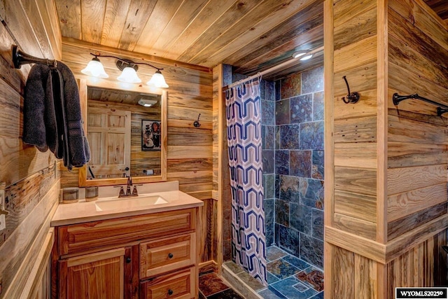 18 High Meadows Rd, Buffalo, WY 82834 - bathroom with vanity, wood walls, wood ceiling, and a tile shower