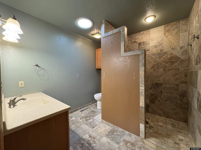 2327 Crestview Dr, Torrington, WY 82240 - full bath featuring a walk in shower, vanity, toilet, and stone tile floors