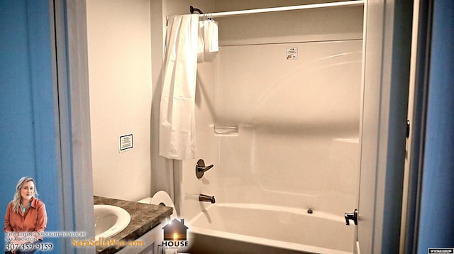 bathroom featuring vanity and shower / tub combo