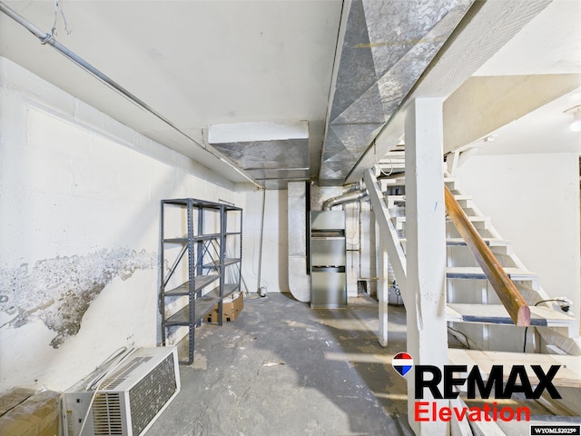 602 S 6th St, Basin, WY 82410 - unfinished below grade area featuring heating unit and stairs