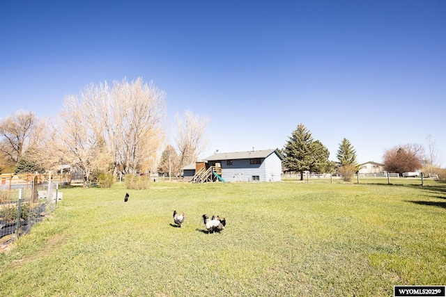 view of yard featuring fence