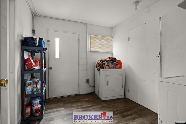 1105 N Elma, Casper, WY 82601 - clothes washing area with concrete block wall, laundry area, washer / clothes dryer, and wood finished floors