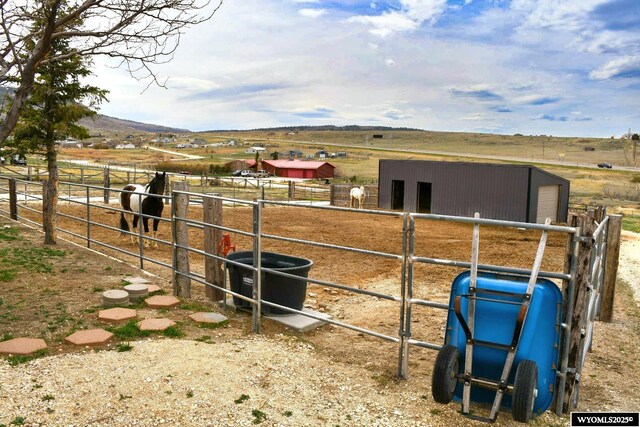 5421 S Okeepa, Casper, WY 82604 - view of horse barn featuring a rural view