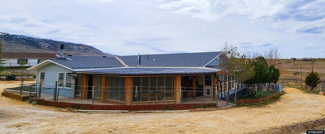 5421 S Okeepa, Casper, WY 82604 - back of property with a mountain view and metal roof
