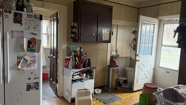 kitchen featuring freestanding refrigerator
