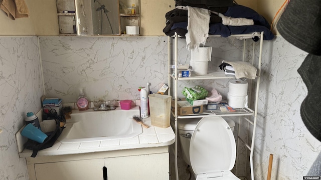bathroom featuring toilet